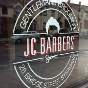 JC Barbers Window