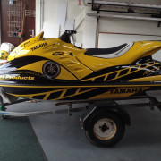 Yellow jet-ski with custom graphics
