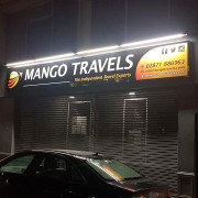 Mango Travels custom shop sign